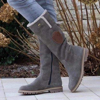 Womens Western cowboy boots with leather belt buckles by Lakd London